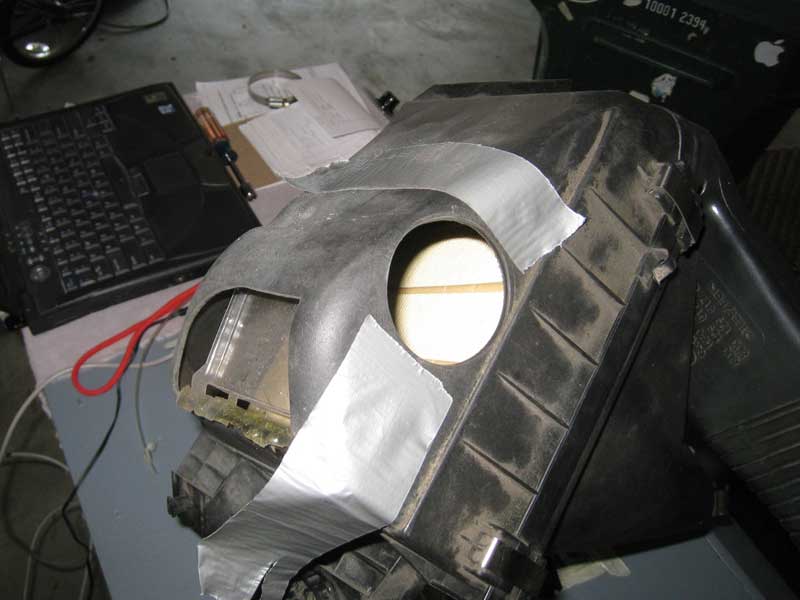 Modified airbox with baffle and one hole