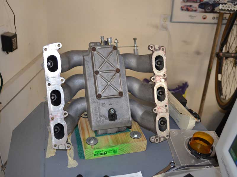 Intake manifold with fuel injectors installed