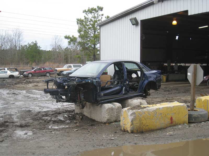 Audi B5 S4 on cinder blocks