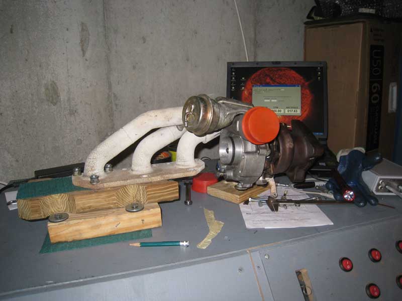 AWE Exhaust Manifold attached to K04
