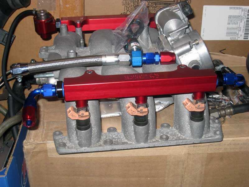 stock s4 fuel injectors with integrated engineering fuel rails