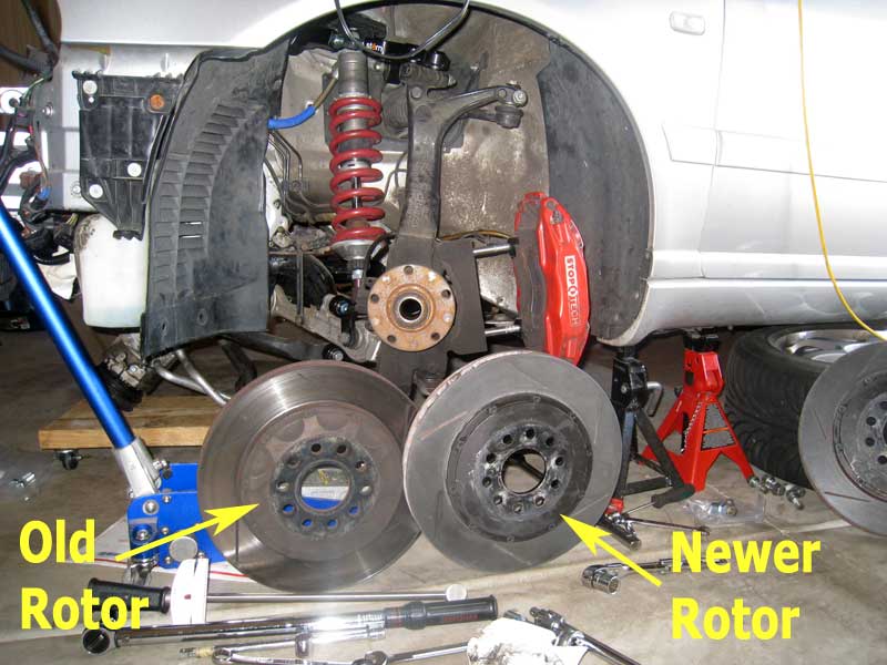 picture of stoptech 332 aero rotors being swapped on my Audi B5 S4